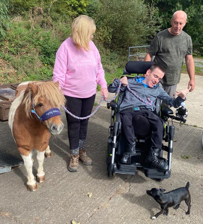 James Coughlan leads a small horse