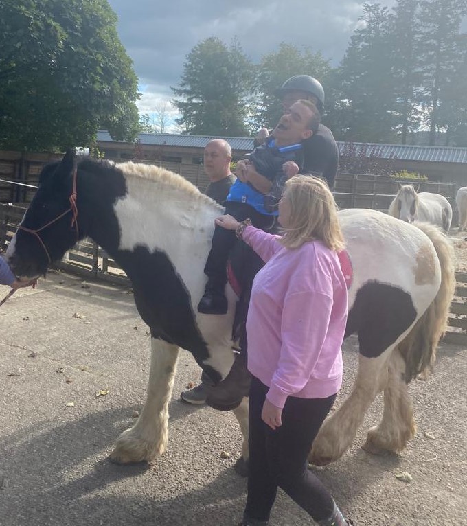 James Coughlan riding a horse