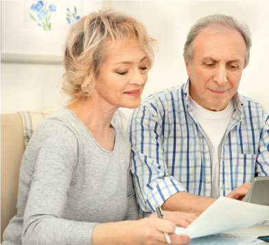 older couple doing paperwork