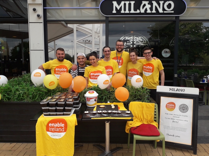 Milano staff fundraising in front of their restaurant
