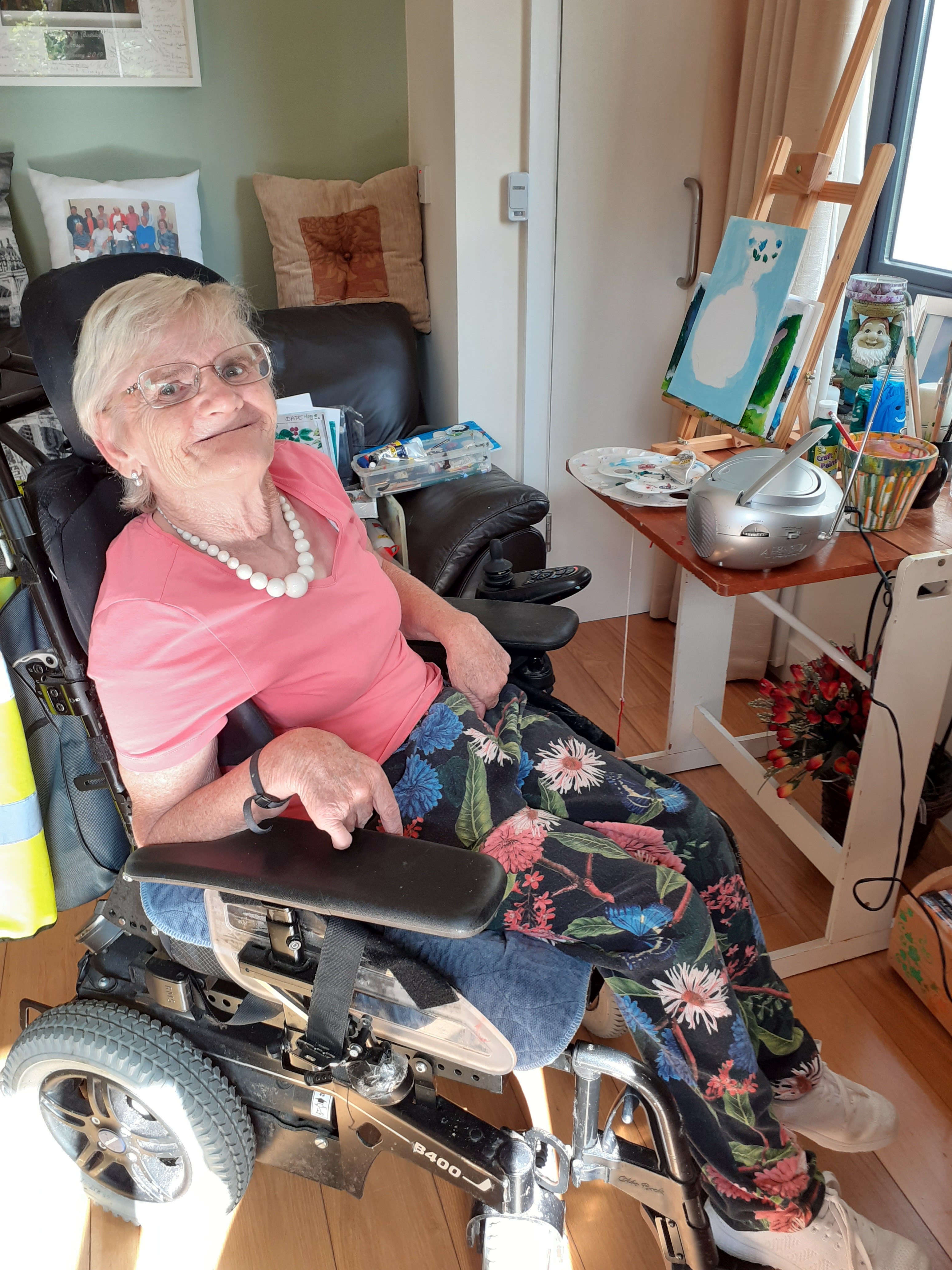 women in wheelchair in her apartment