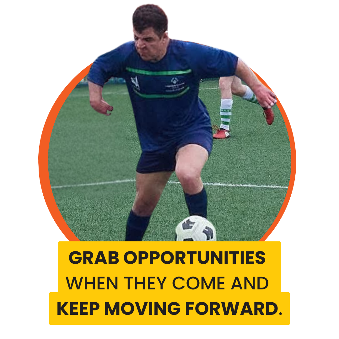 A soccer player in a navy blue uniform dribbling a ball on a green field during a game. A quote on the image says: Grab opportunities when they come and keep moving forward.