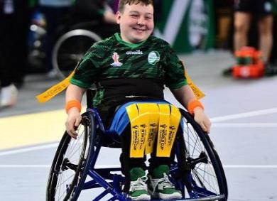 Teenage rugby player in a sports wheelchair